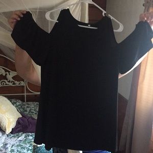 New without tags. Black off the shoulder shirt.